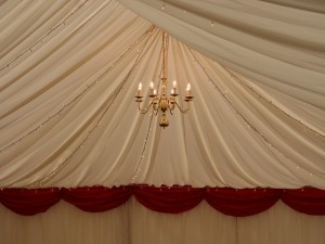 Fairy lighting in the roof of a wedding marquee